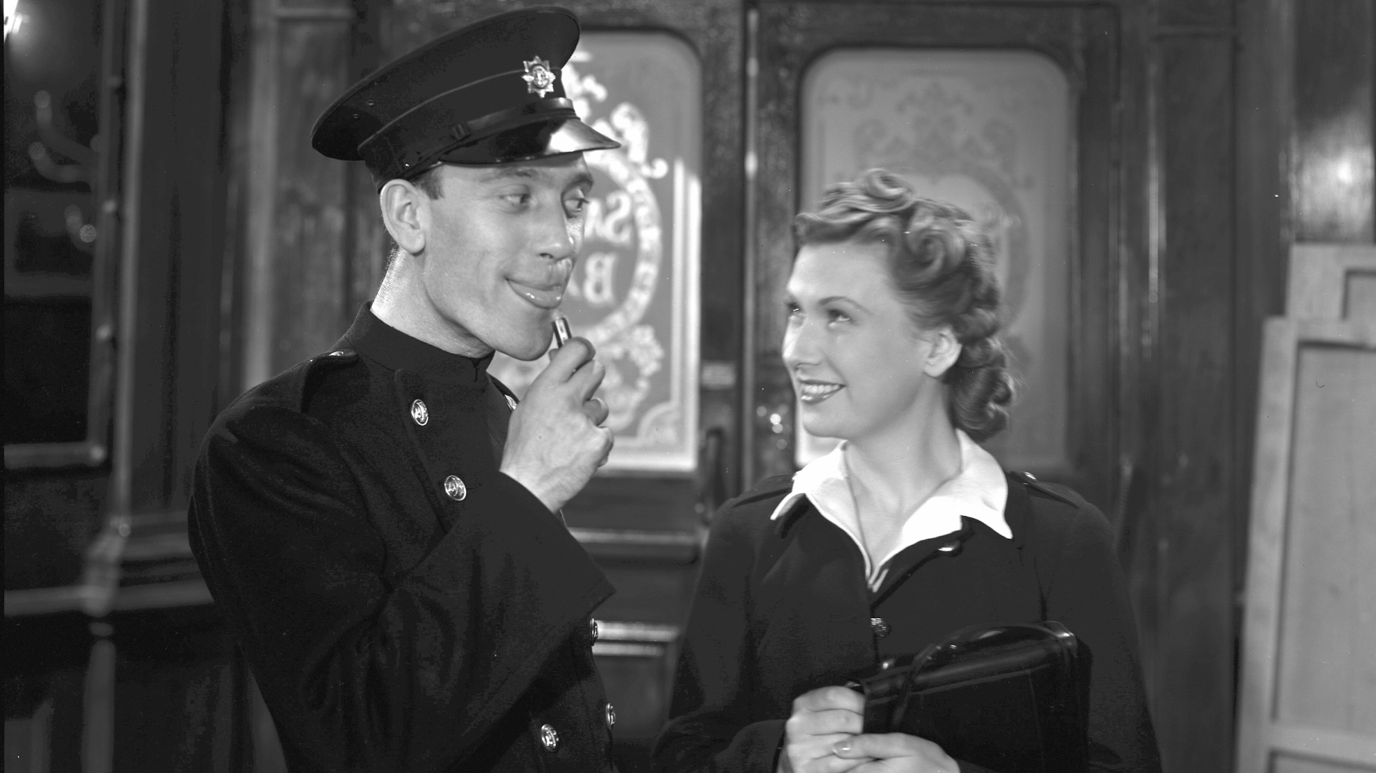 Tommy Trinder and Meriel Forbes in The Bells Go Down