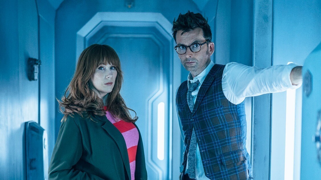 Catherine Tate and David Tennant standing in a spaceship corridor in Doctor Who Wild Blue Yonder special 2