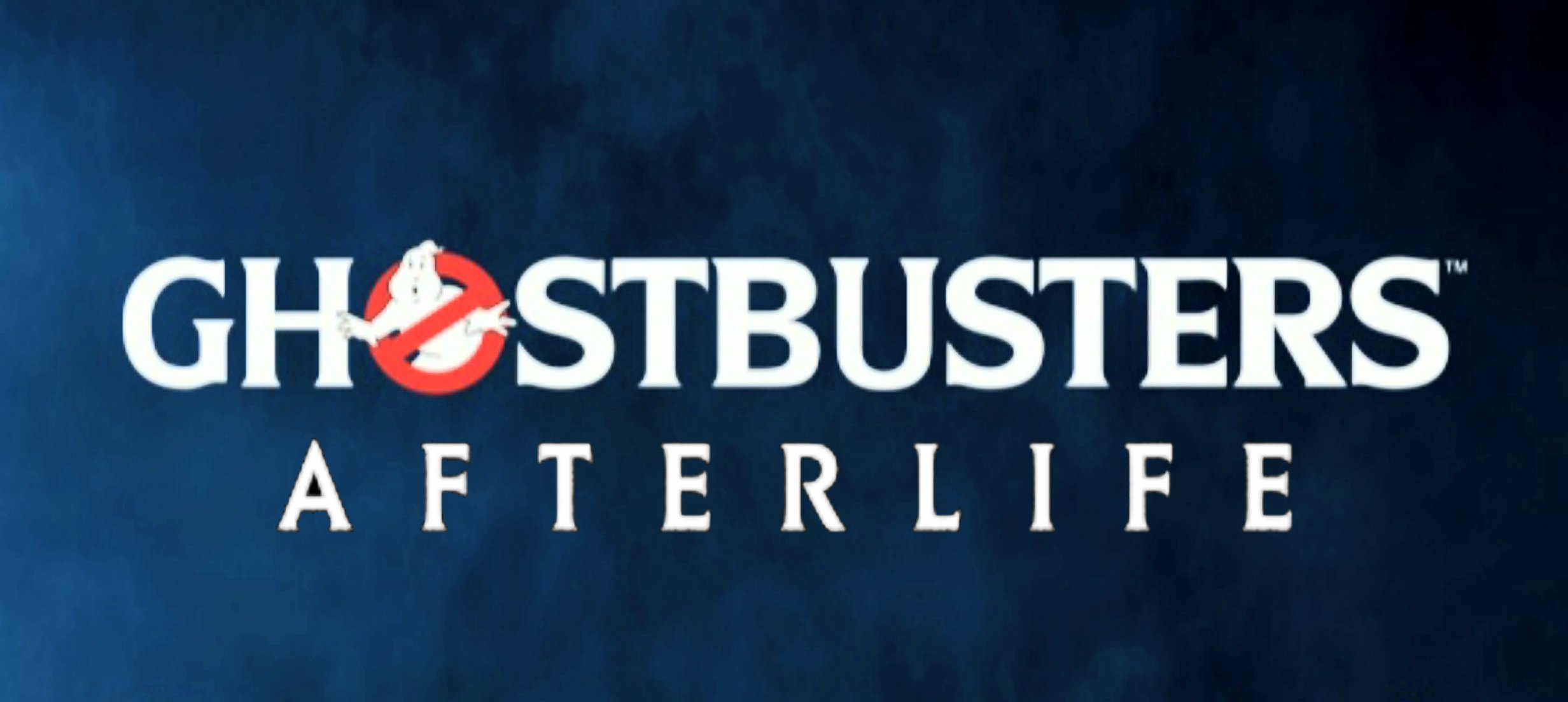 Image shows a Ghostbusters logo with a red stop sign with a ghost in it and a dark blue background