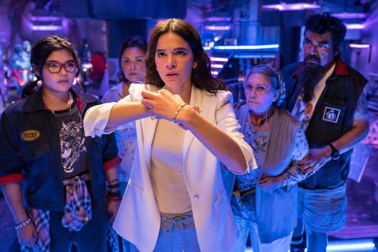 BELISSA ESCOBEDO as Milagro, ELPIDIA CARRILLO as Rocio, BRUNA MARQUEZINE as Penny, ADRIANA BARRAZA as Nana and GEORGE LOPEZ as Uncle Rudy in Warner Bros. Pictures Blue Beetle