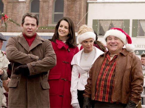 The Finches (Matthew Broderick and Kristin Davis) and Halls (Kristin Chenoweth and Danny DeVito) display varying reactions to a holiday-themed event.