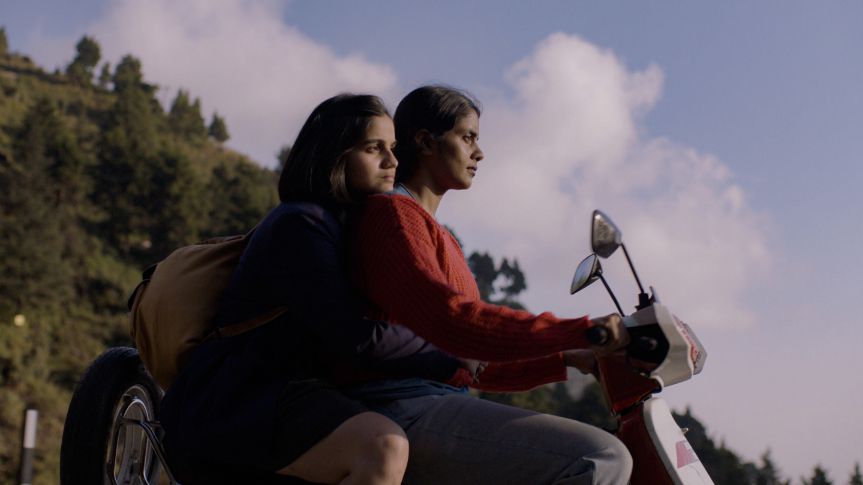 Mila and Anila on motorcycle, in Modern Films' Girls Will Be Girls.