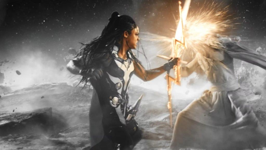 Tess Thompson as King Valkyrie, wielding the lightning bolt of Zeus against Gorr the God Butcher Christian Bale in Thor Love and Thunder