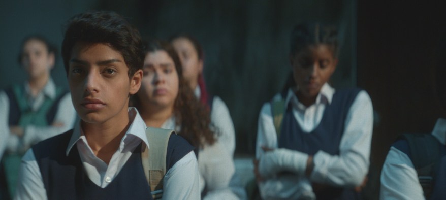 School girls in uniform at a school, in a scene from the film From the Ashes