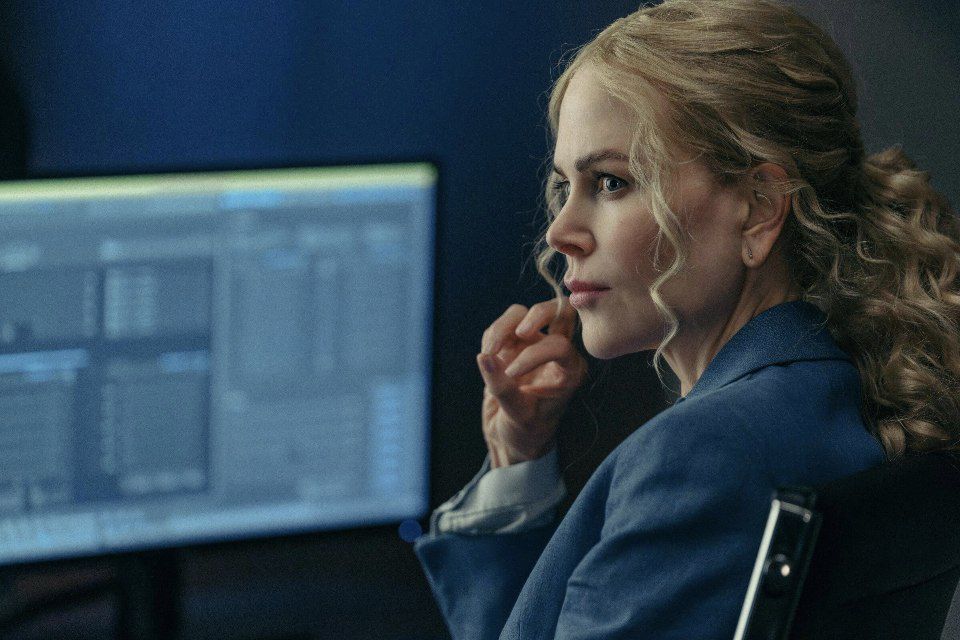 Nicole Kidman sitting infront of a computer, in Lioness
