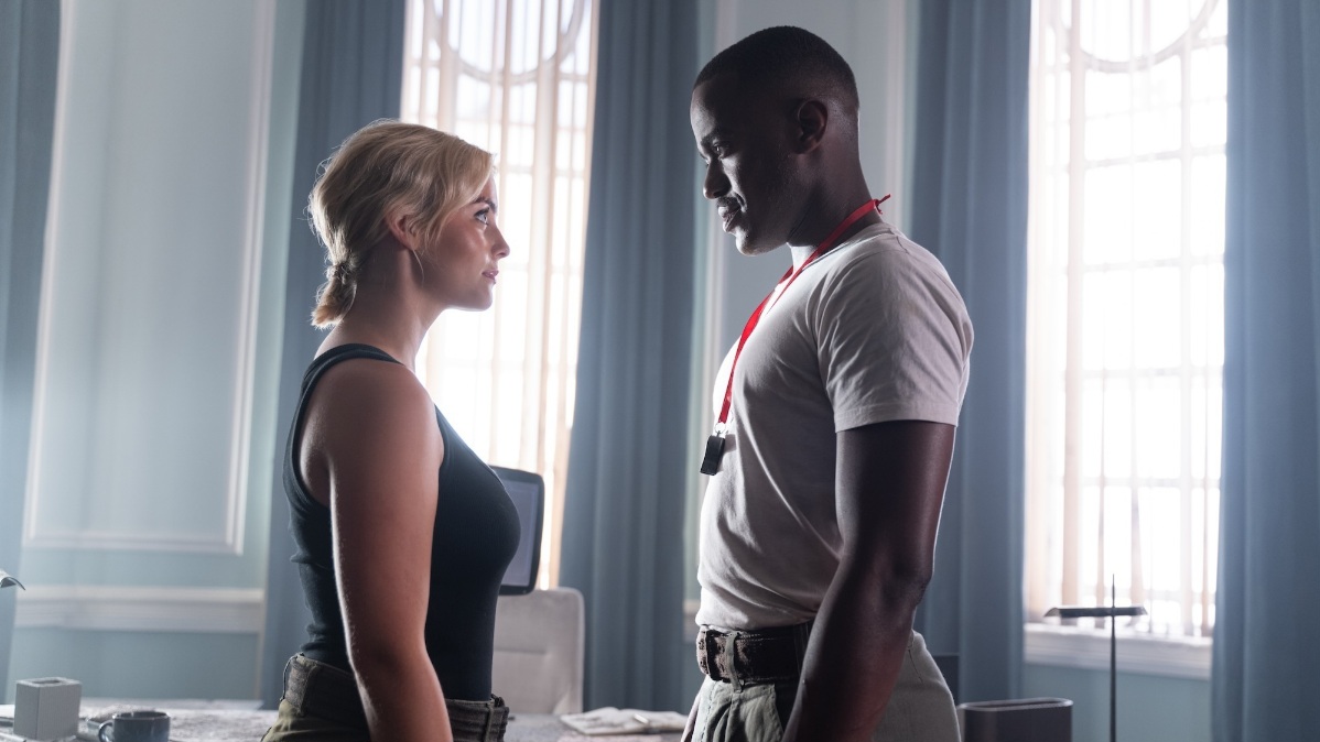 Millie Gibson as Ruby Sunday and Ncuti Gatwa as the Doctor, both standing opposite eachother.