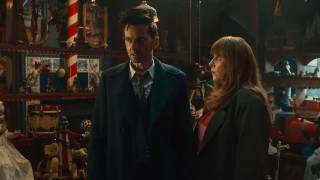 The Doctor and Donna Noble standing in a Toy shop to confont The Toymaker in The Giggle