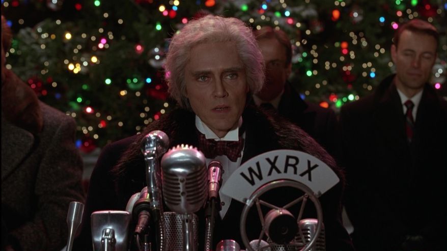Christopher Walken giving a speech in front of Tree in Batman Returns