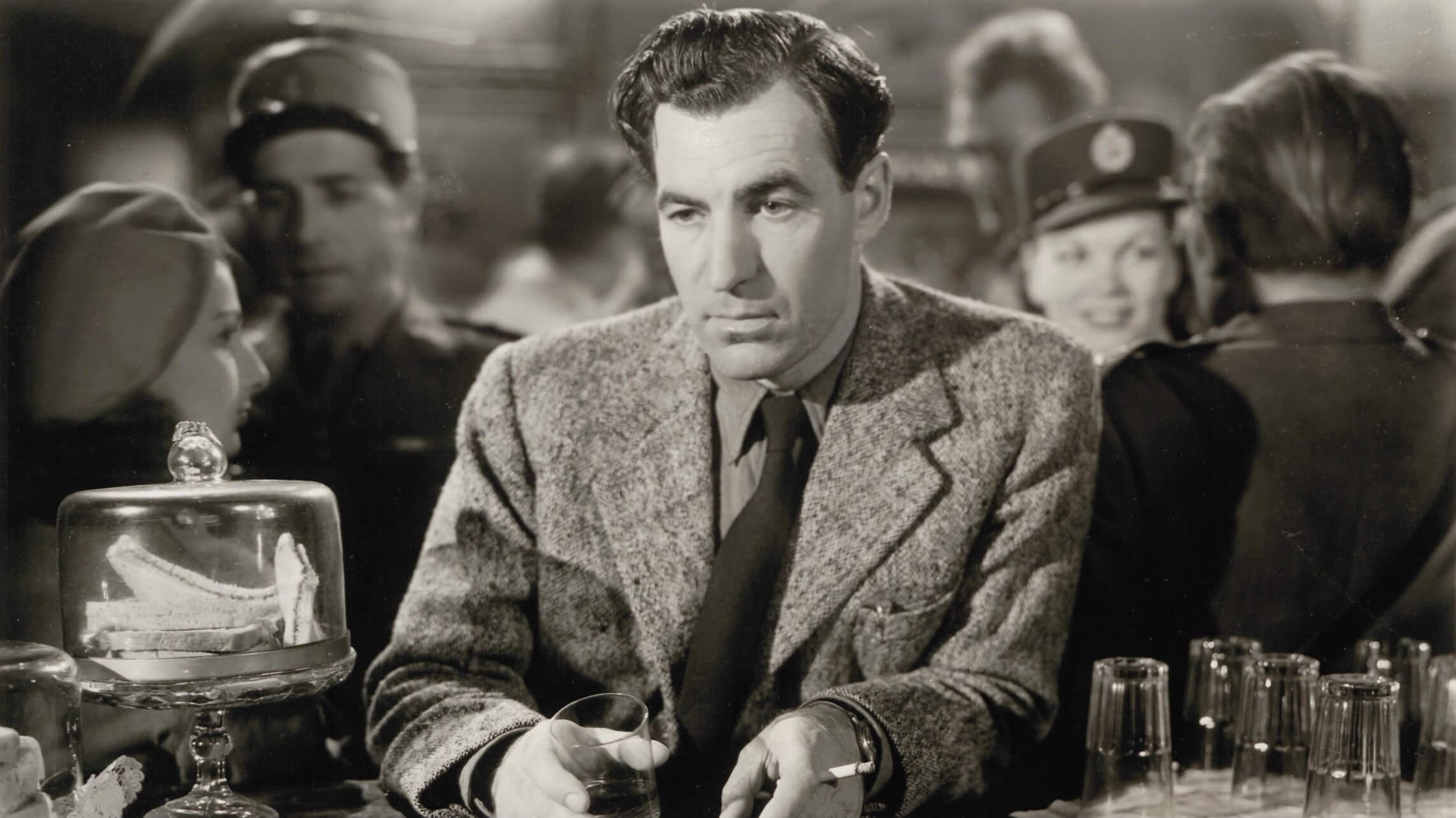 David Farrar in a bar scene for The Small Back Room