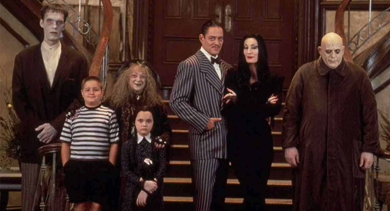 Lurch, Pudsley, Granny Wednesday, Gomez, Morticia, and Uncle Fester