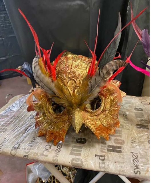 Creating a feathered bird mask.