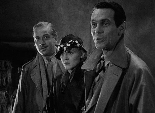Three characters who are in the black and white film.