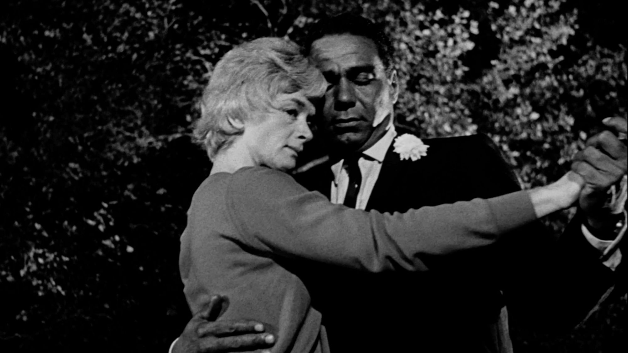 Julie Cullen (Barbara Barrie) and Frank Richards (Bernie Hamilton) embracing in a scene from One Potato Two Potato